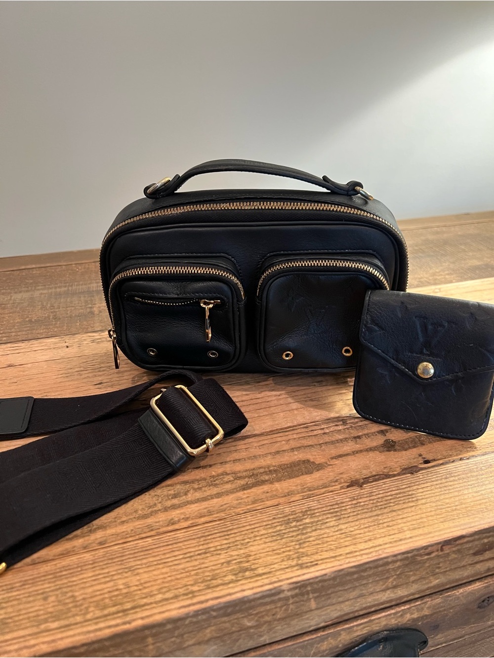 Louis Vuitton Utility Empreinte Black Leather Crossbody Pouch with Gold Hardware